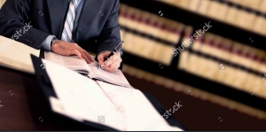 attorney signing papers