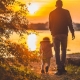 Father and child at sunset
