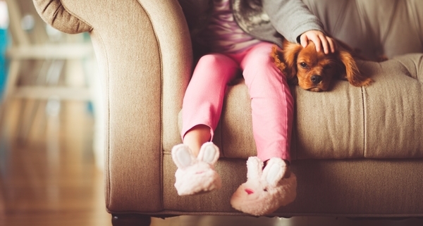 girl with slippers and puppy