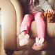 girl with slippers and puppy