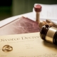 Divorce decree and wooden gavel