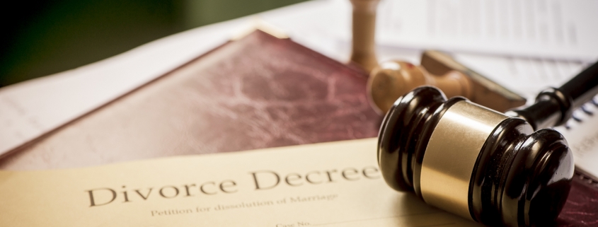 Divorce decree and wooden gavel