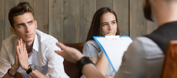 young couple meeting with psychologist